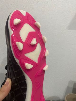 Botas de tacos, campo de futbol