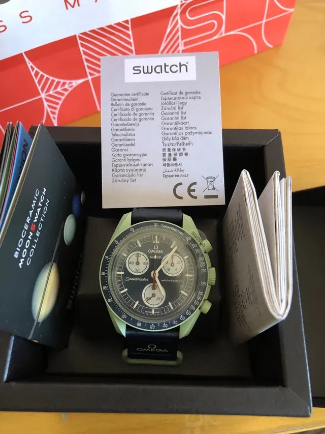 Reloj Swatch by Omega Tierra