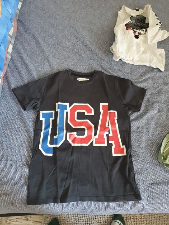 maglia maniche corte  taglia 8 anni