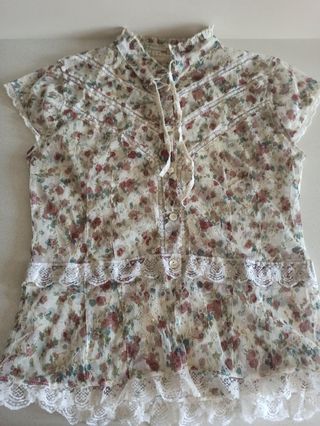 Blusa transparente flores