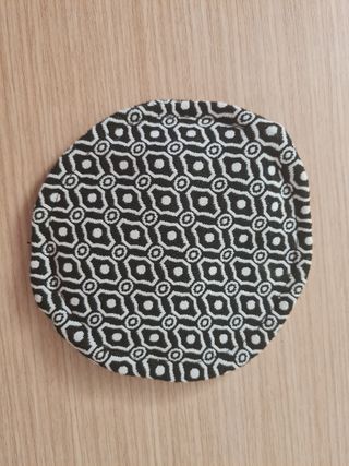 Monedero para guardar auriculares.