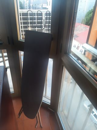 vendo tabla de planchar con funda nueva
