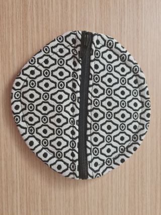 Monedero para guardar auriculares.