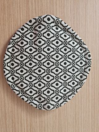 Monedero para guardar auriculares.