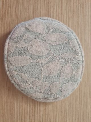 Monedero para guardar auriculares.