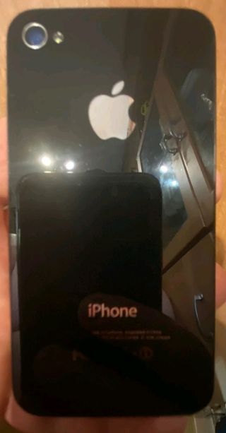 iPhone 4 funcionando y con caja para piezas