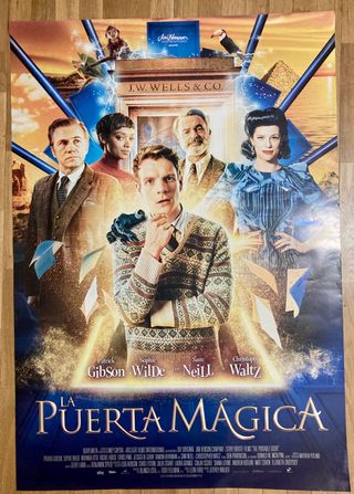 Poster Cine la puerta mágica.