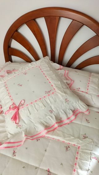 Cabecero de cama y edredon