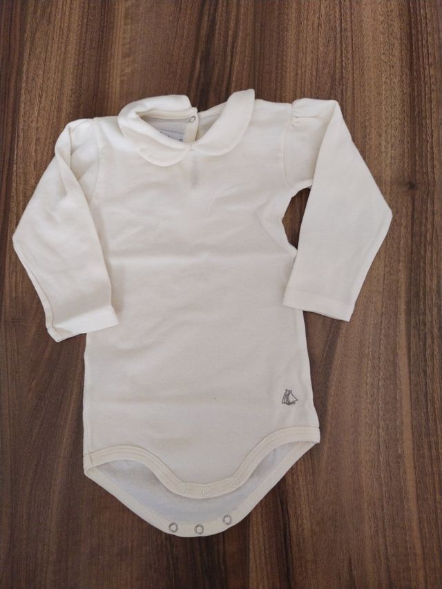 body crudo talla 12 meses
