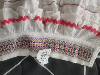 Falda volantes blanca con detalles