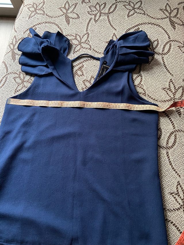 Blusa o camisa, sin mangas. Talla 40