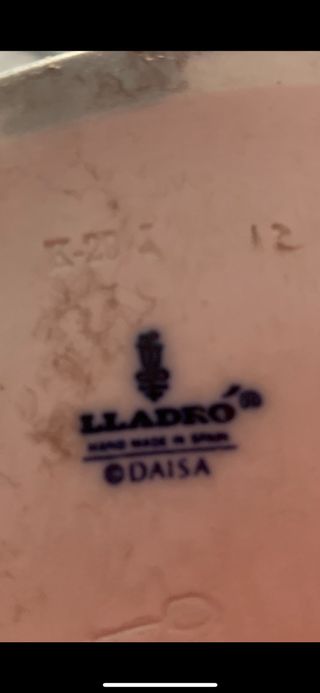 Cerámica LLADRÓ "pareja de diplomaticos" N.1430