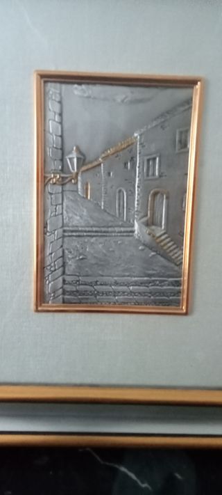 due quadri con riquadro in argento