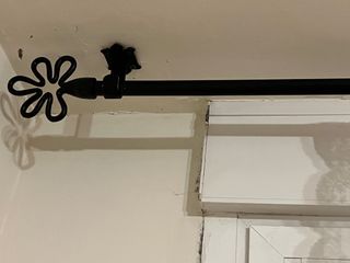 Barra de cortina con soportes