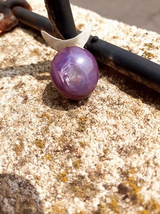 Colgante de plata con rubi star