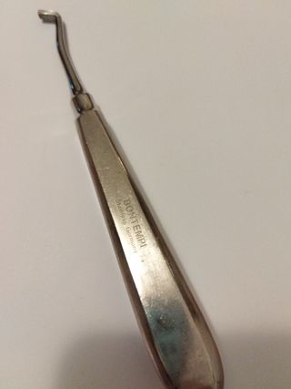 Adaptador de bandas para ortodoncia