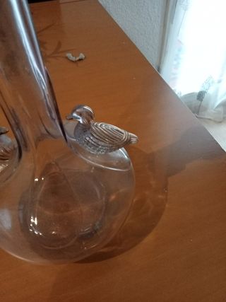 botella de licor antigua de pajaros