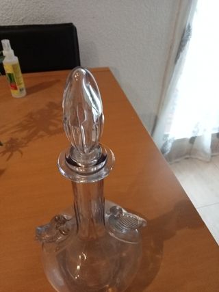 botella de licor antigua de pajaros