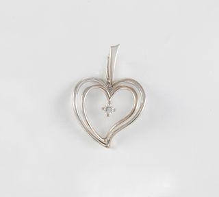 Colgante corazón en oro blanco 18k con brillante