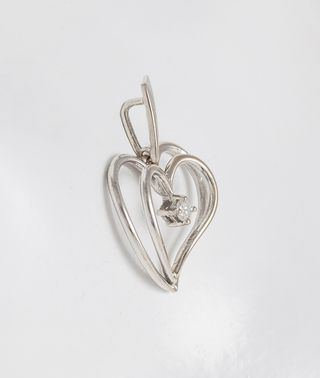 Colgante corazón en oro blanco 18k con brillante