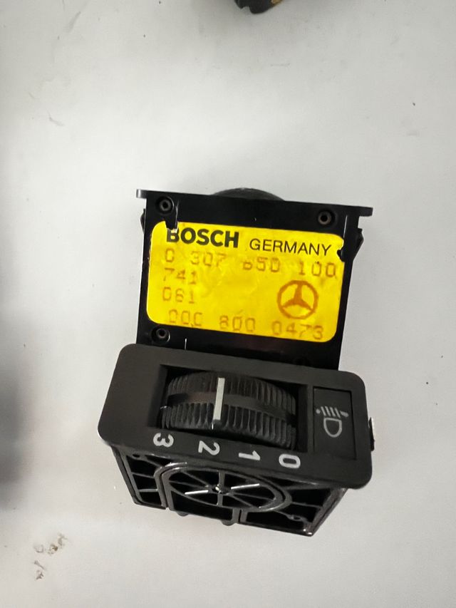 Regulador altura luces Mercedes 190 W201