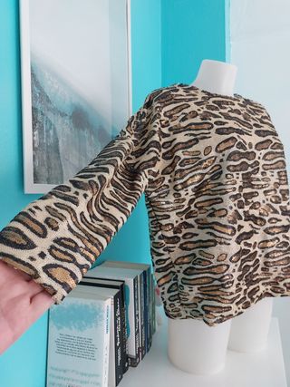 Suéter de lentejuelas de Zara