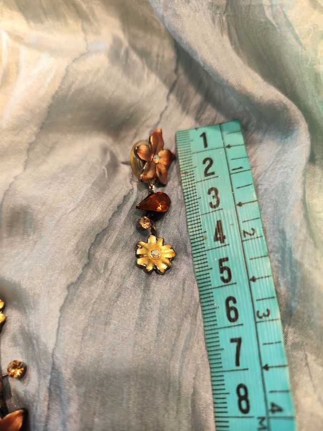 conjunto de colgante y pendientes