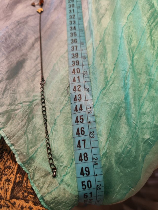 conjunto de colgante y pendientes