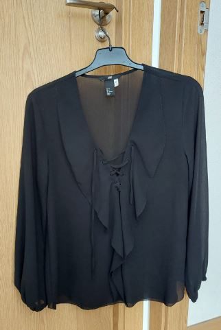 Blusa negra mujer manga larga transparente