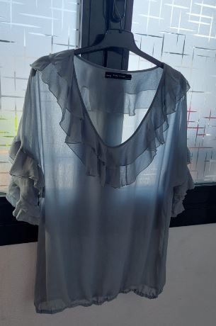 Blusa azul semitransparente manga corta talla S