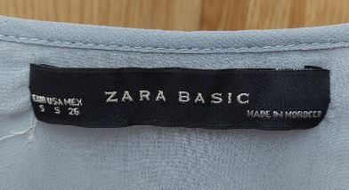 Blusa azul semitransparente manga corta talla S