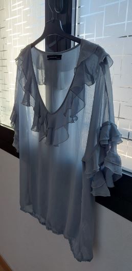 Blusa azul semitransparente manga corta talla S