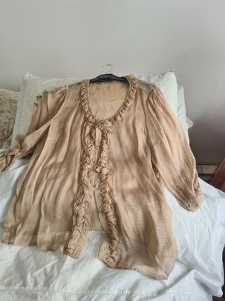 Blusita muy romántica.