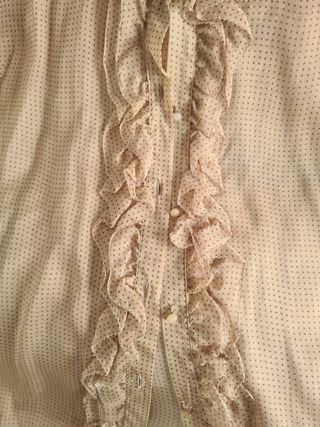 Blusita muy romántica.