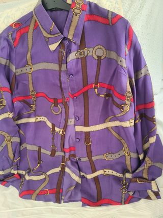 BLUSA MALVA CON DIBUJOS