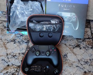 PS4 2015 + MANDO FUSION PRO + FUNDA + JUEGOS