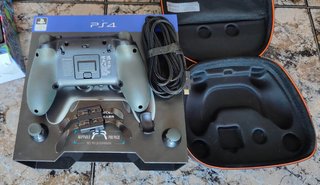 PS4 2015 + MANDO FUSION PRO + FUNDA + JUEGOS