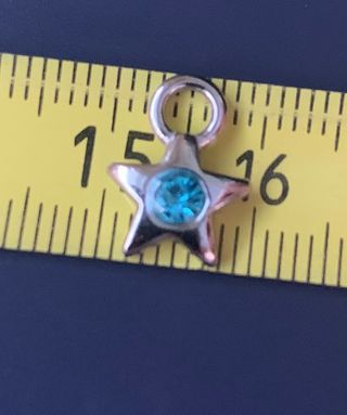 Colgante de estrella con piedra azul