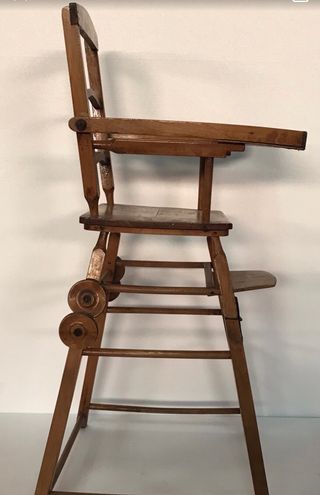 Antigua silla de bebé