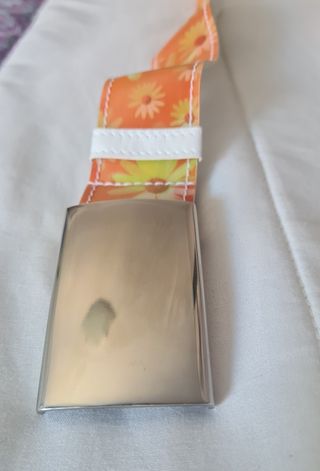 Cinturón margaritas holográfico