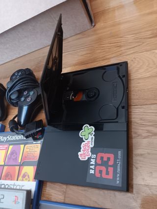 Play Station 2 slim +2mandos +8juegos +2microfonos