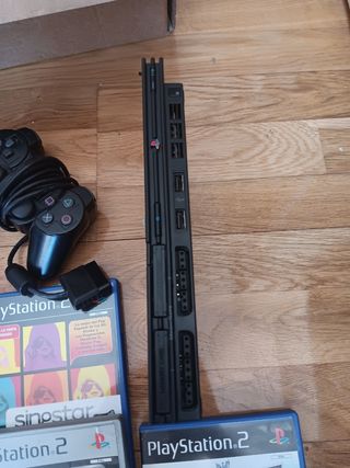 Play Station 2 slim +2mandos +8juegos +2microfonos