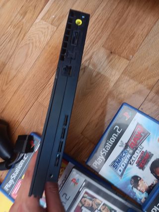 Play Station 2 slim +2mandos +8juegos +2microfonos