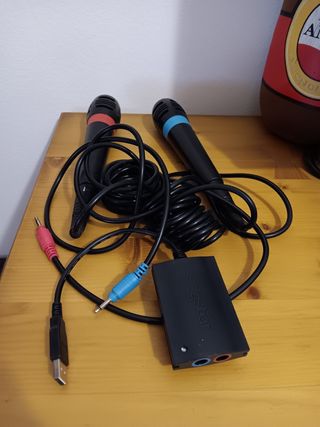 Play Station 2 slim +2mandos +8juegos +2microfonos