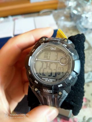 reloj QYQ 