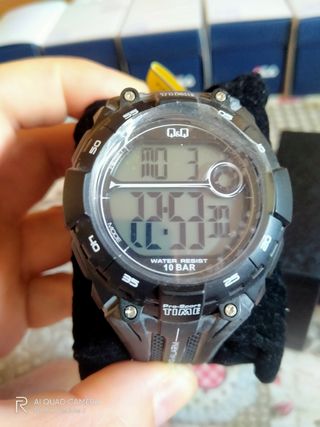 reloj QYQ 
