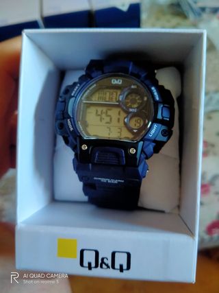 reloj QYQ 