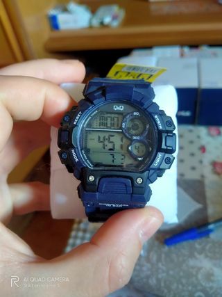 reloj QYQ 