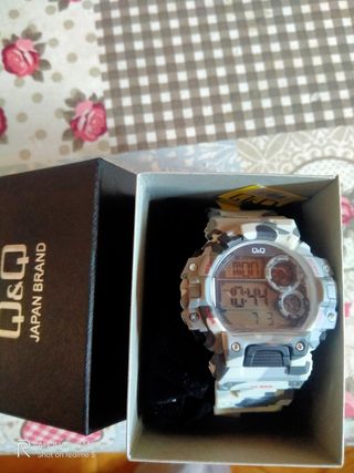reloj QYQ 