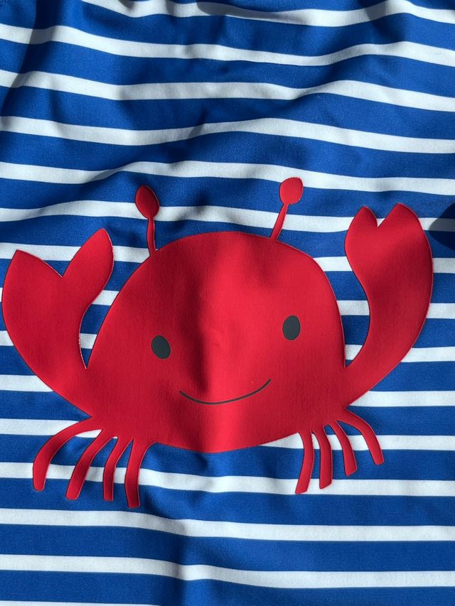 Traje de baño bebé de una pieza y sombrero a juego